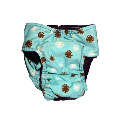 brown-and-white-snow-flakes-on-light-blue-diaper-back brown-and-white-snow-flakes-on-light-blue-diaper-back