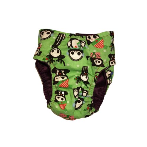 christmas-skeleton-figures-on-green-diaper-back christmas-skeleton-figures-on-green-diaper-back